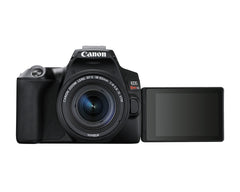 Canon EOS Rebel SL3 with the 18-55mm lens and the vari-angle touchscreen swung out to the side