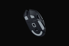 Underside of the Razer Basilisk V3 X HyperSpeed in Black, showing the PTFE mouse feet, optical sensor and the 2.4 GHz, Bluetooth and off switch