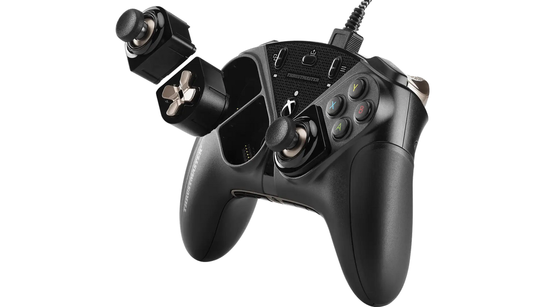 Thrustmaster eSwap X Pro controller in Black with the left mini-stick and D-pad modules lifted out of their slots