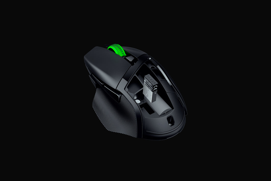 Razer Basilisk V3 X HyperSpeed in Black with the top cover removed, showing the AA battery bay and the stored USB wireless dongle