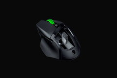 Razer Basilisk V3 X HyperSpeed in Black with the top cover removed, showing the AA battery bay and the stored USB wireless dongle