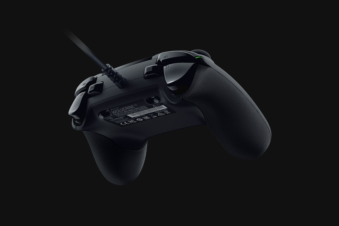 Back of the Razer Wolverine V2 wired controller in Black, showing the triggers, the trigger stop switches and the cable strain relief