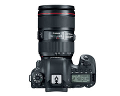 Top of the Canon EOS 6D Mark II showing the mode dial, top LCD panel, hot shoe and the 24-105mm f/4L lens