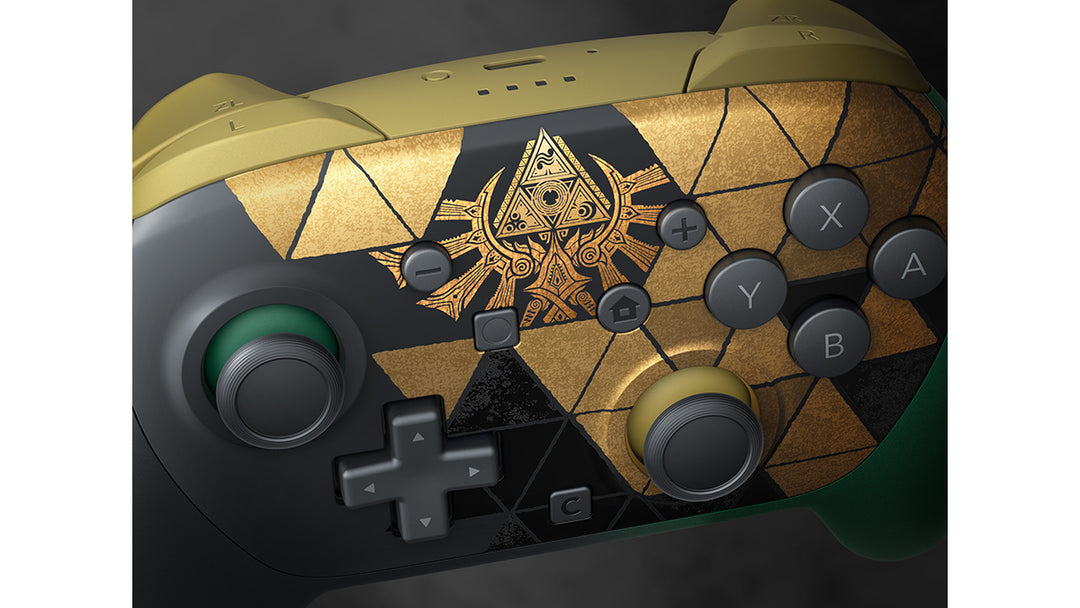 Nintendo Switch 2 Pro Controller The Legend of Zelda 40th Anniversary Edition, close-up of the gold Triforce crest