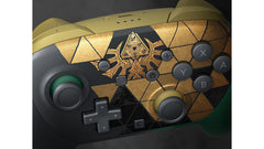 Nintendo Switch 2 Pro Controller The Legend of Zelda 40th Anniversary Edition, close-up of the gold Triforce crest