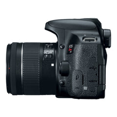 Side of the Canon EOS Rebel T7i showing the port covers and the 18-55mm IS STM lens