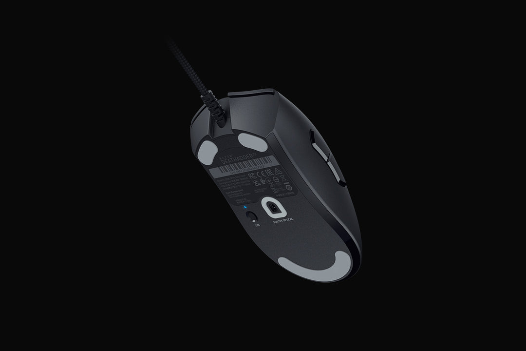 Underside of the Razer DeathAdder V3 in Black, showing the PTFE mouse feet and the Focus Pro optical sensor