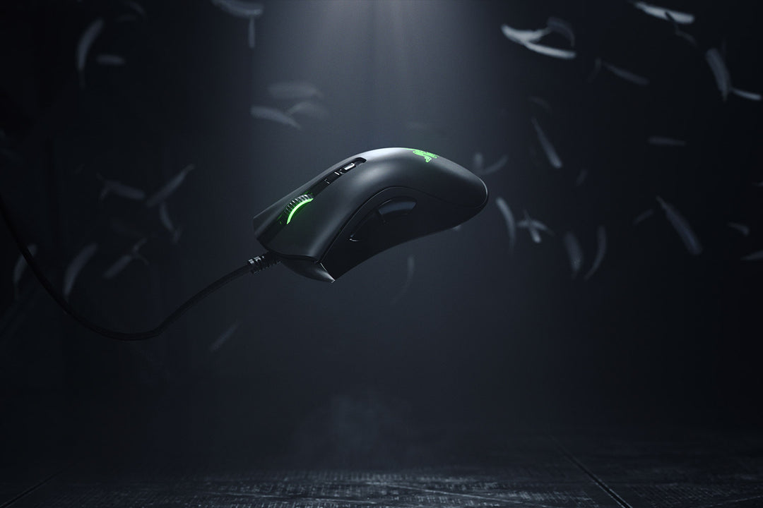 Razer DeathAdder V2 in Black floating in the air on a dark background, showing its right-handed side profile