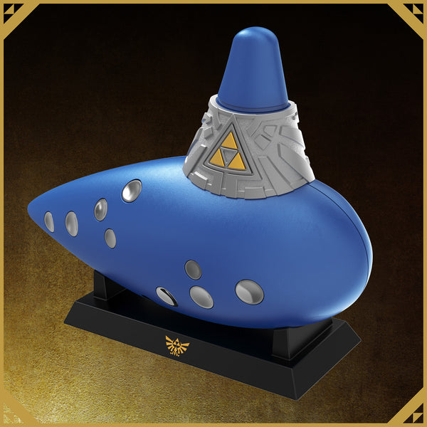 The HORI Electric Ocarina of Time displayed on its stand base