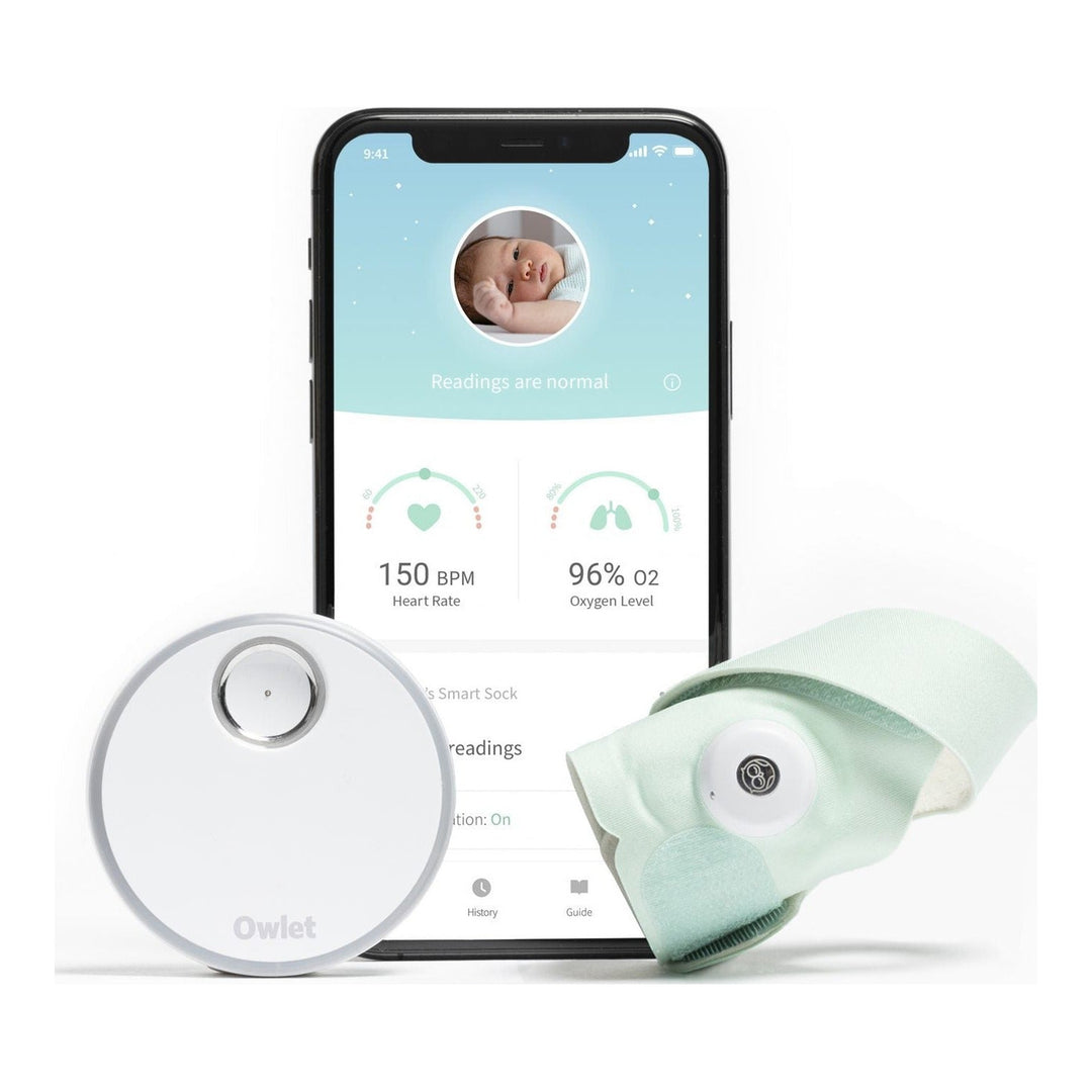 Owlet Smart Sock 3 Mint pack. Base station, mint sock sensor, and readings screen.