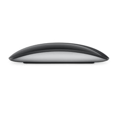 Side profile of the black Apple Magic Mouse, showing its low curved shape