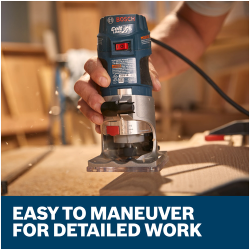 Hand guiding the Bosch Colt PR20EVS palm router along a board edge for detailed work