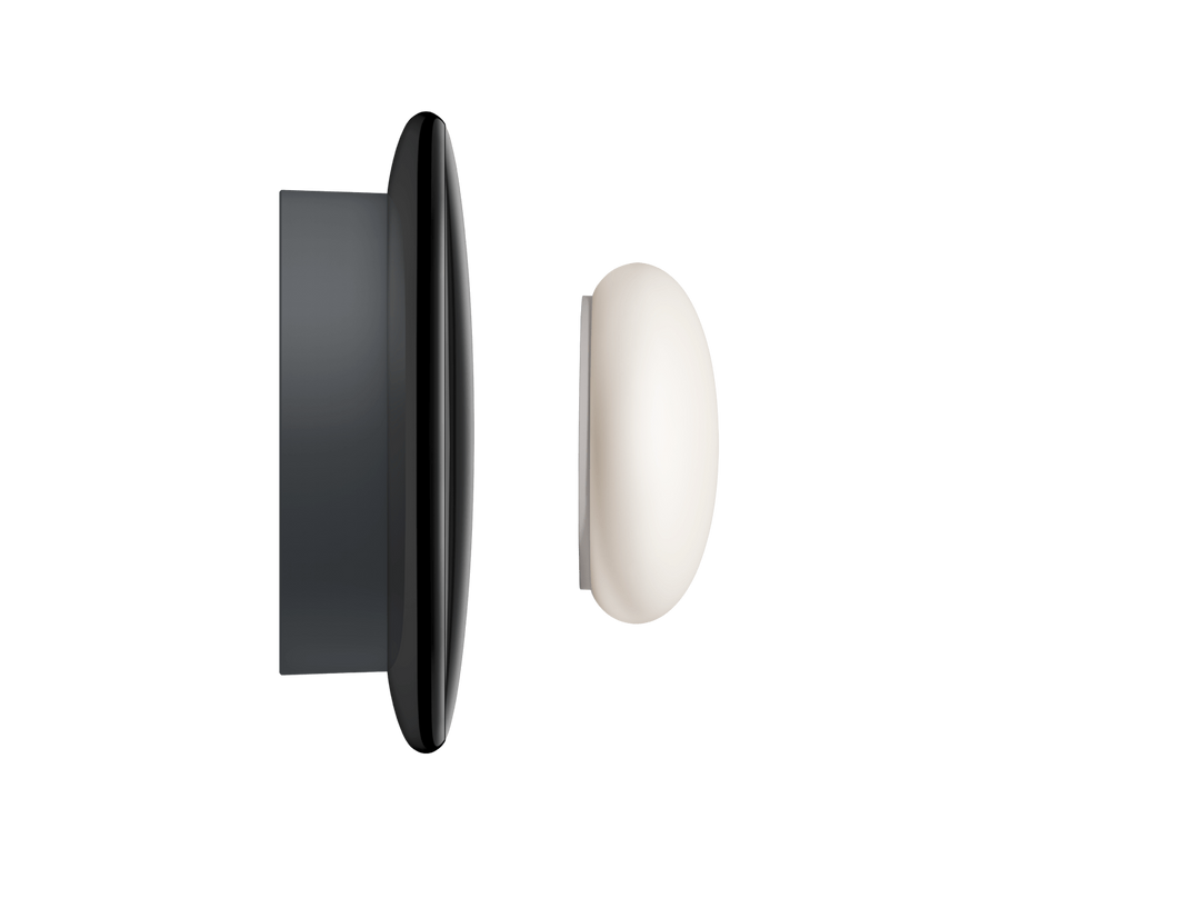 Nest Learning Thermostat 4th gen in Polished Obsidian side profile with Nest Temperature Sensor #color_polished-obsidian