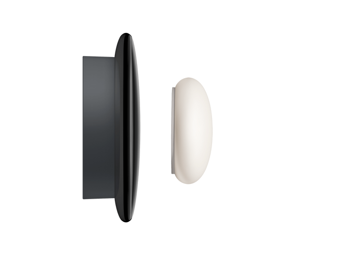 Nest Learning Thermostat 4th gen in Polished Obsidian side profile with Nest Temperature Sensor #color_polished-obsidian