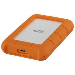 LaCie Rugged USB-C 5TB lying flat, angled left, showing the USB-C port