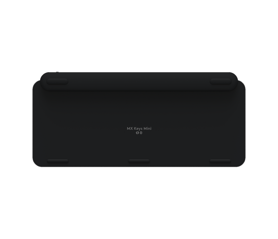 Underside of the Logitech MX Keys Mini in Black with its rubber feet and raised rear edge