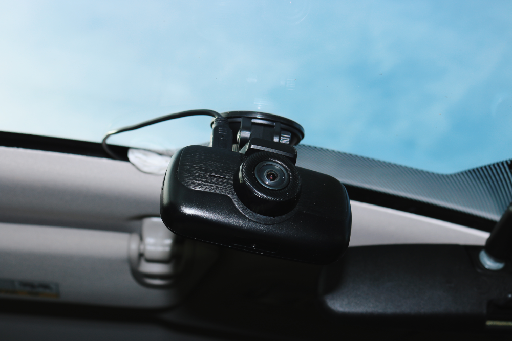myGEKOgear Orbit 960 dash cam installed on a windshield, close-up