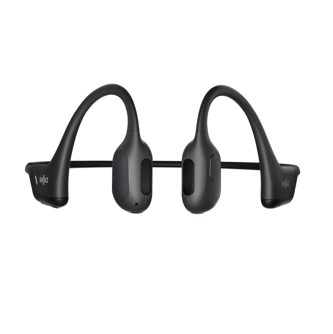 Shokz OpenRun Pro in black seen from the front, showing both transducers, ear hooks and the band