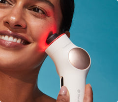 TheraFace PRO white in use on the cheek with red LED light therapy
