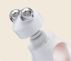 TheraFace PRO white with the Microcurrent Ring attached, close up