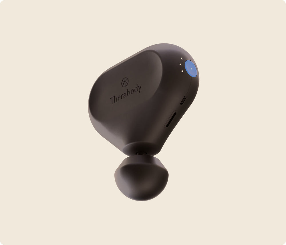 Theragun Mini 2nd Gen black, angled view with the power button, speed lights and USB-C port