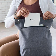 Verbatim External All-in-One Optical Writer being slipped into a tote bag for travel