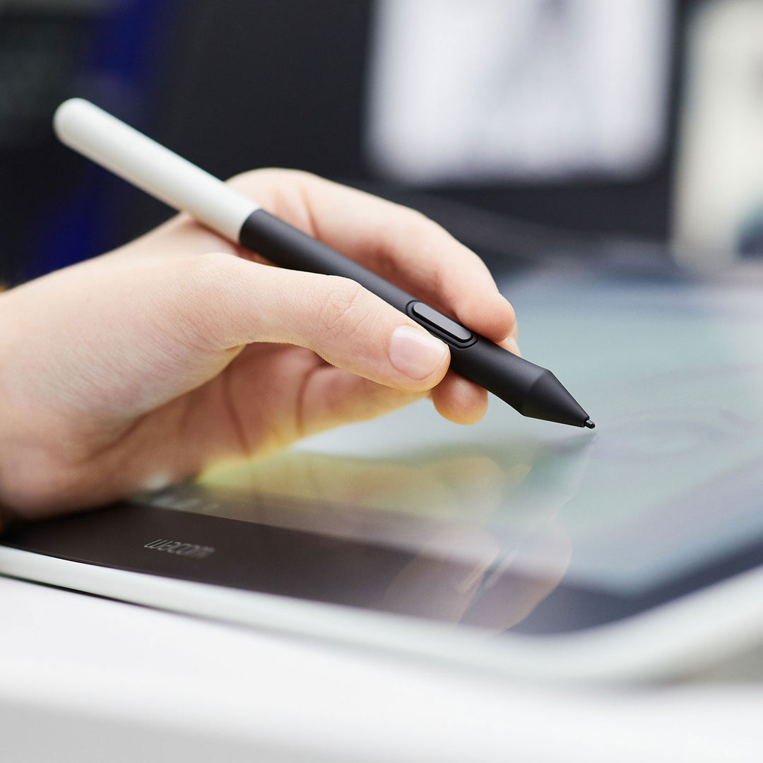 Close-up of the battery-free Wacom One Pen drawing on the pen display surface